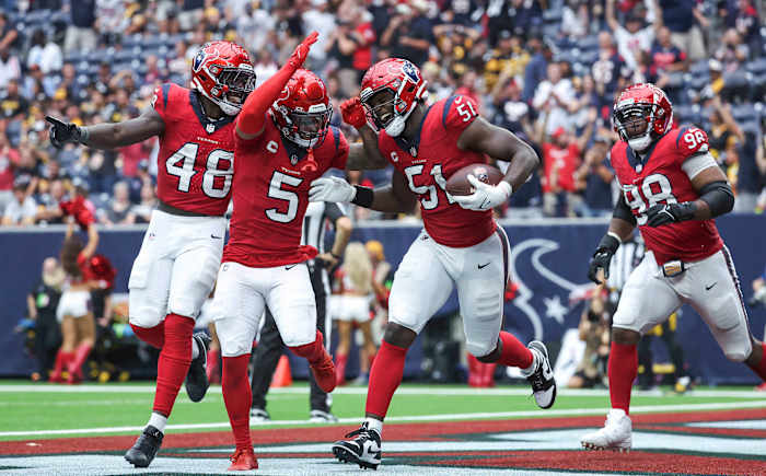 Texans defensive end Will Anderson Jr. (51) and safety Jalen Pitre (5) react after a play during the fourth quarter against the Pittsburgh Steelers at NRG Stadium.